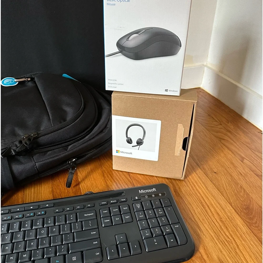 HP work station set. Complete with travel backpack, headset, mouse and keyboard